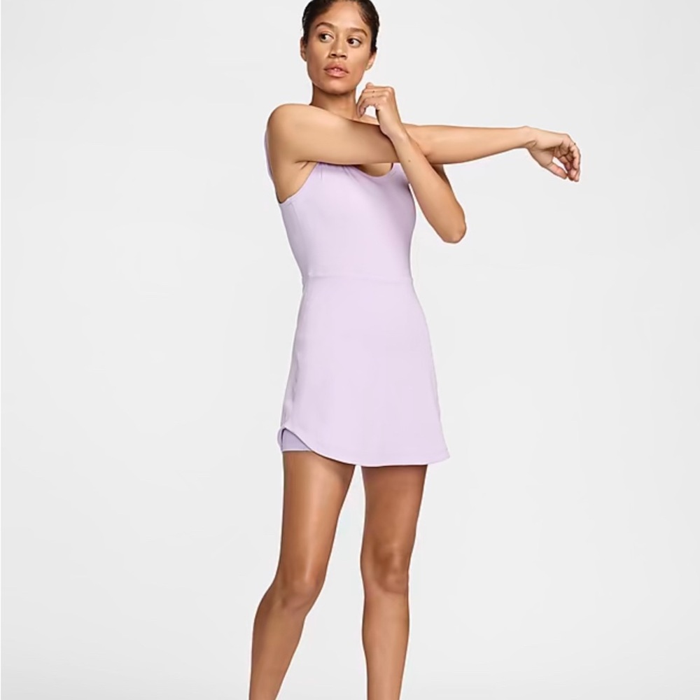 This is a brand new Nike light purple dress .. sx XL Dri Fit